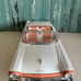 Sun Star 1957 Ford Fairlane 500 Skyliner 1:18 Diecast Model Car Coral/White