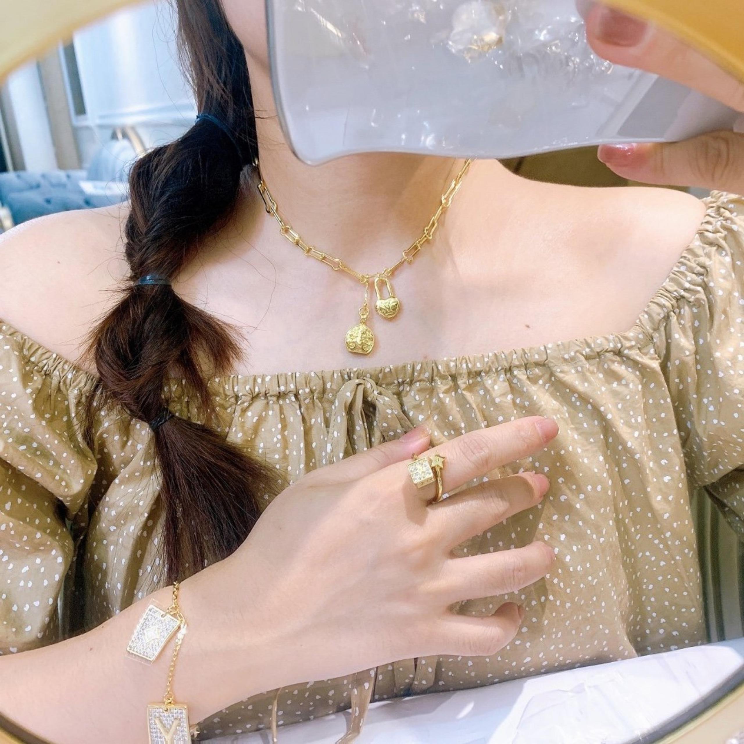 A peach heart full of diamond necklace
