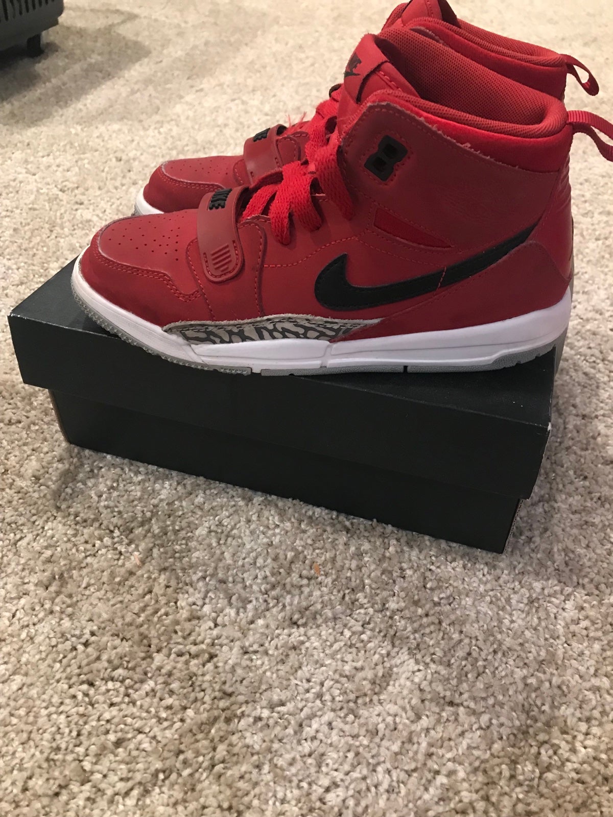 Boys red Jordan legacy 312 (toro)