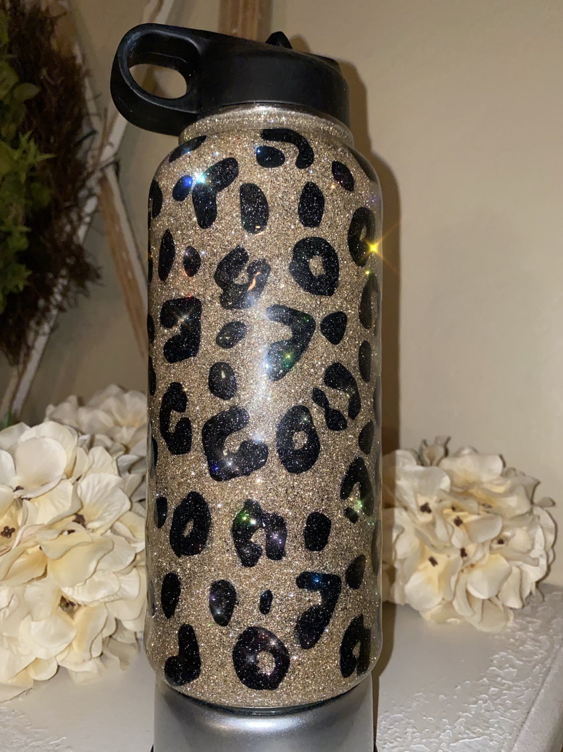 Leopard glittered 32 oz water bottle.
