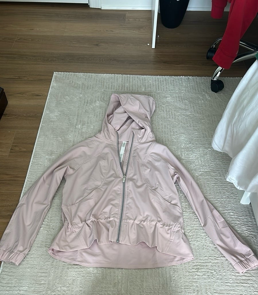 Lululemon Brand New Never Worn Rain Jacket.