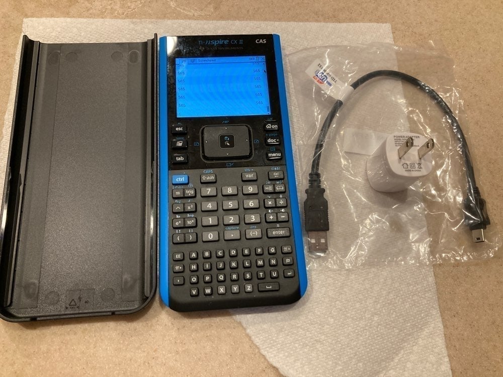 Texas Instruments TI Nspire CX II CAS Graphing Calculator with charger USB cable