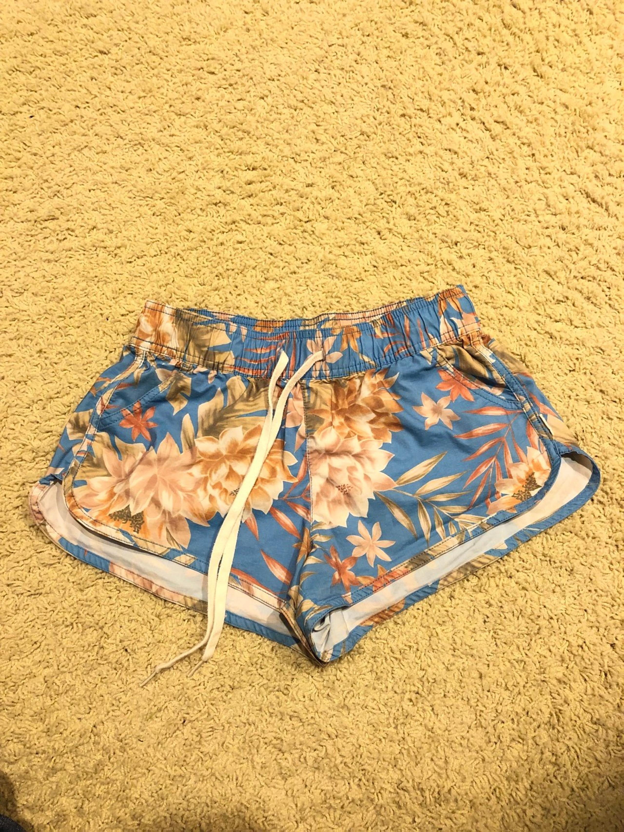 Billabong blue floral swim shorts