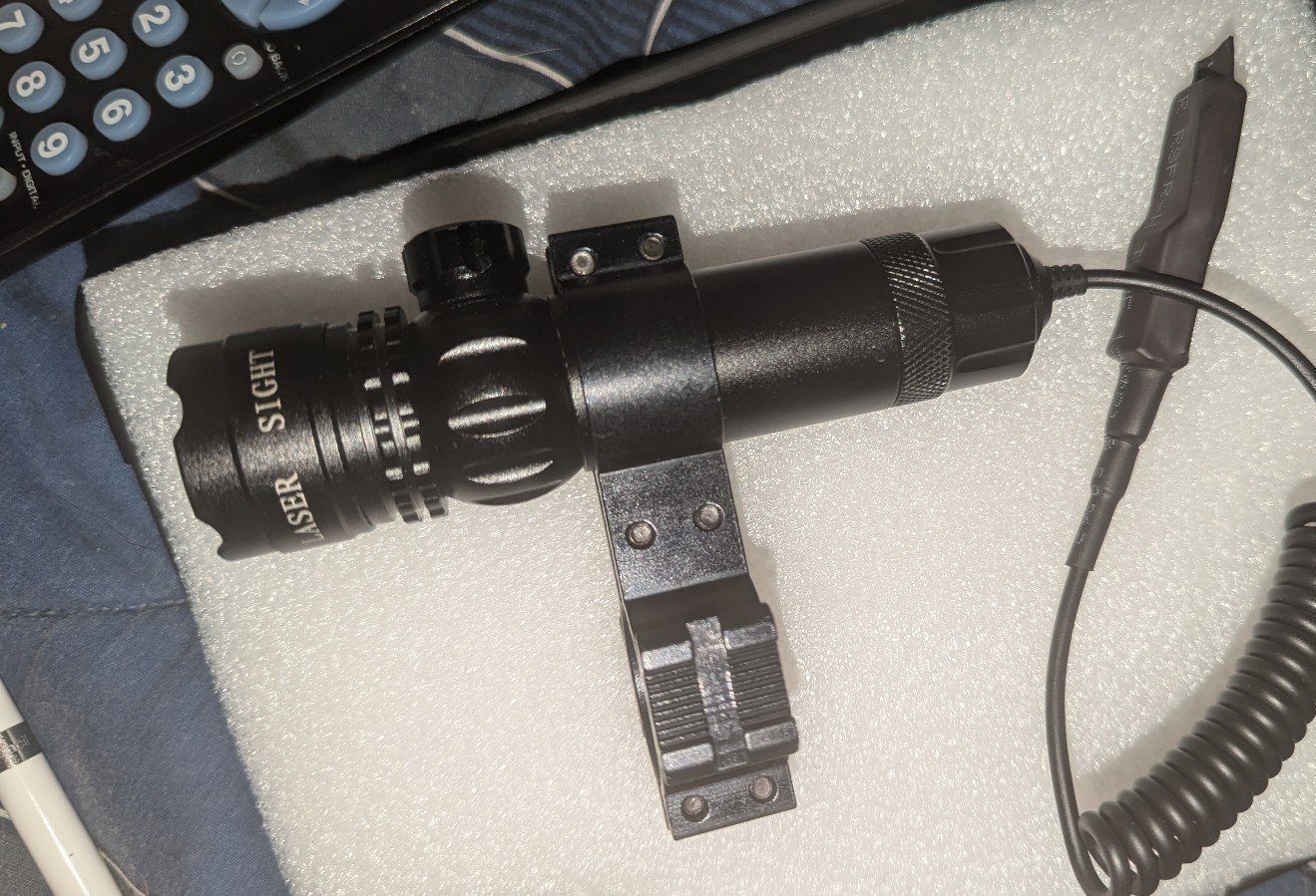 Rifle scope attachment