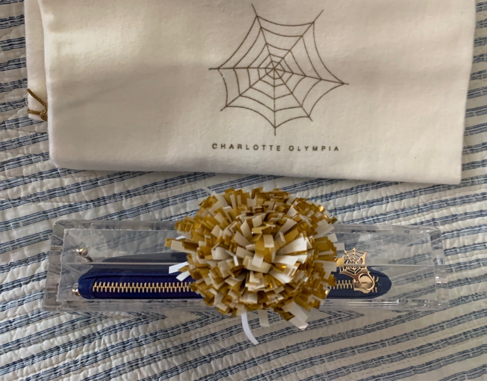 Charlotte Olympia Cheerleader shops PomPom Varsity Pandora Clutch Bag & Pouch