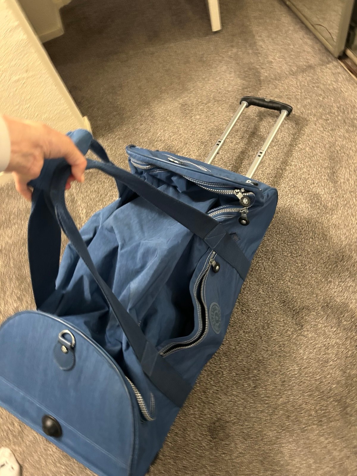 Kipling rolling luggage / traveling bag