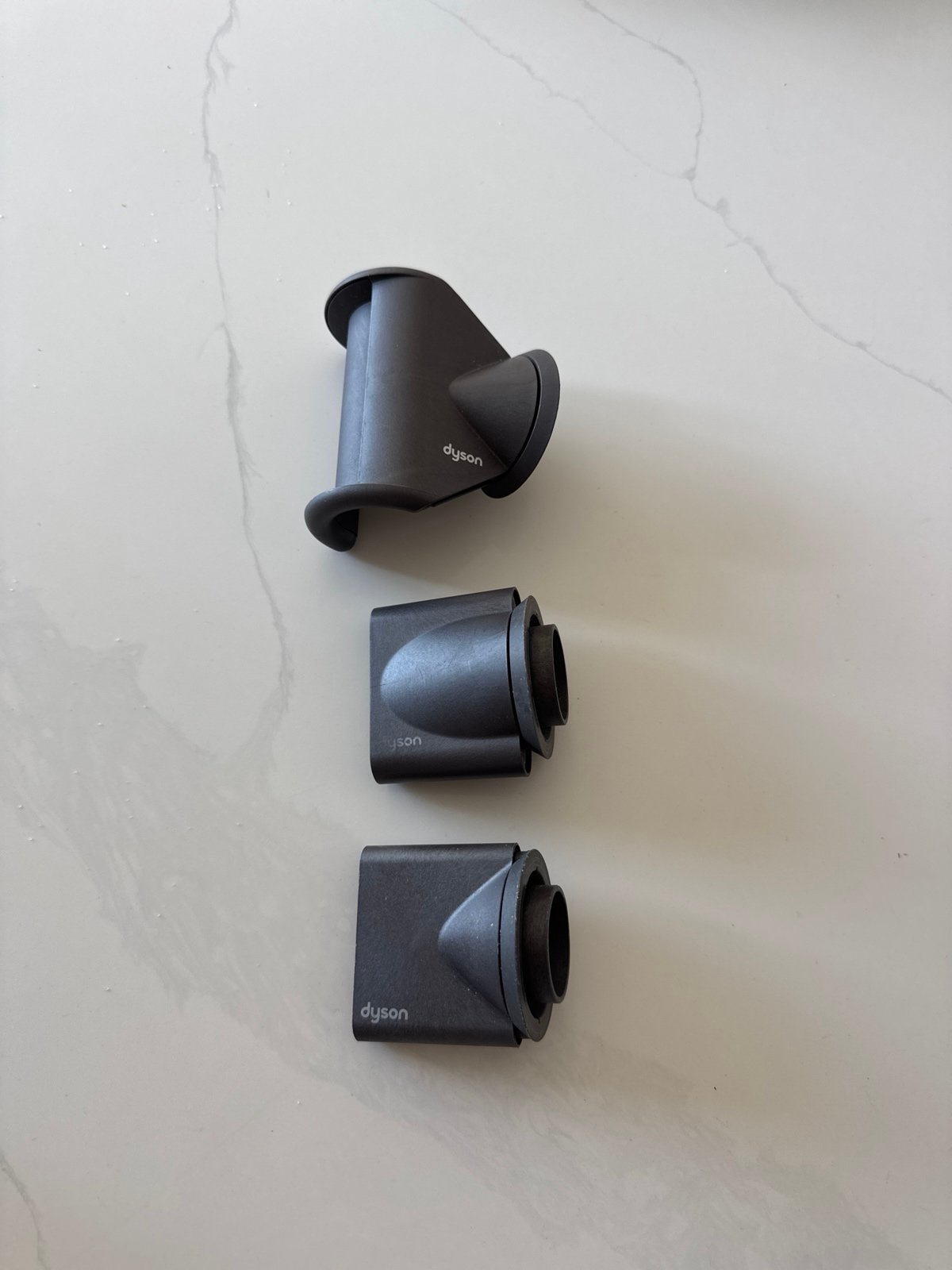 Set of four Dyson blow dryer attachments