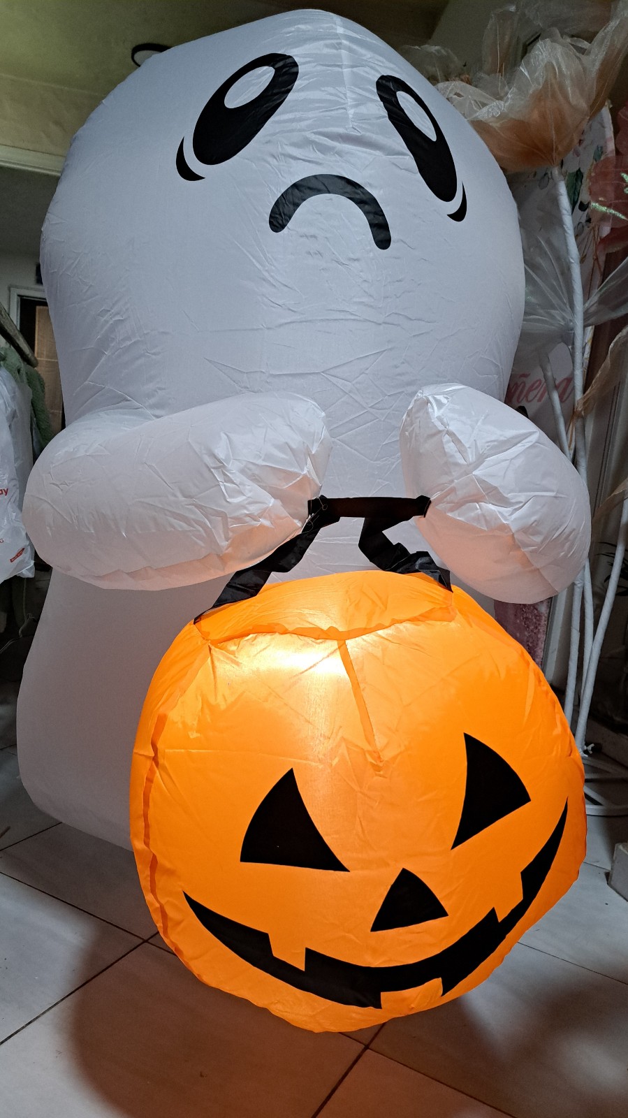 Halloween inflatable ghost with a pumpkin