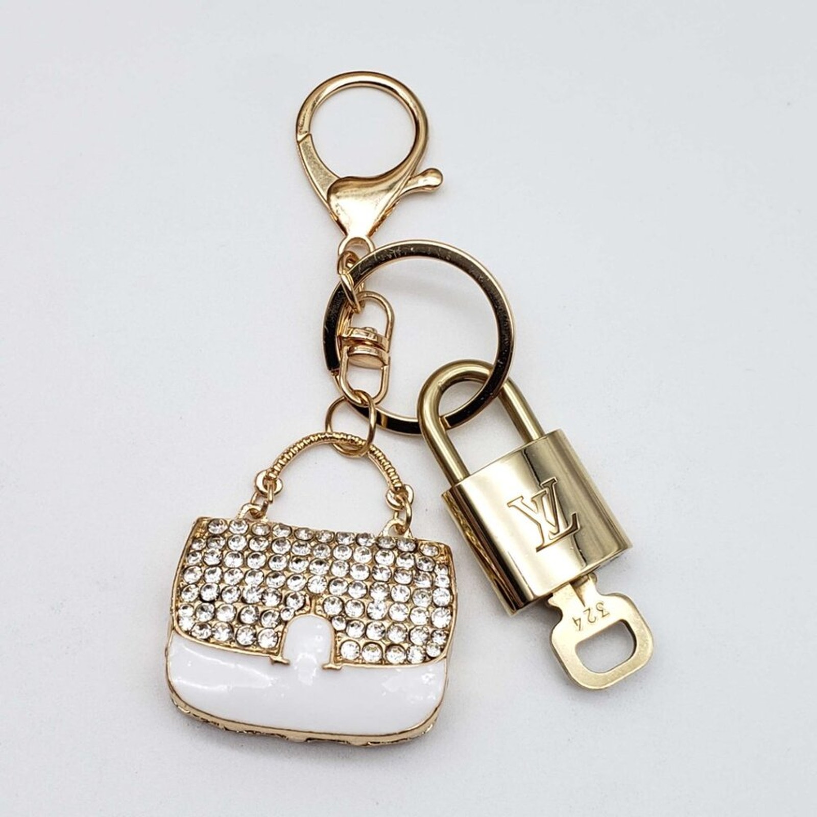 100% Authentic Louis Vuitton Lock and Key with Bag Keycharm