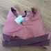 Bandier LE ore pink wrap sports bra