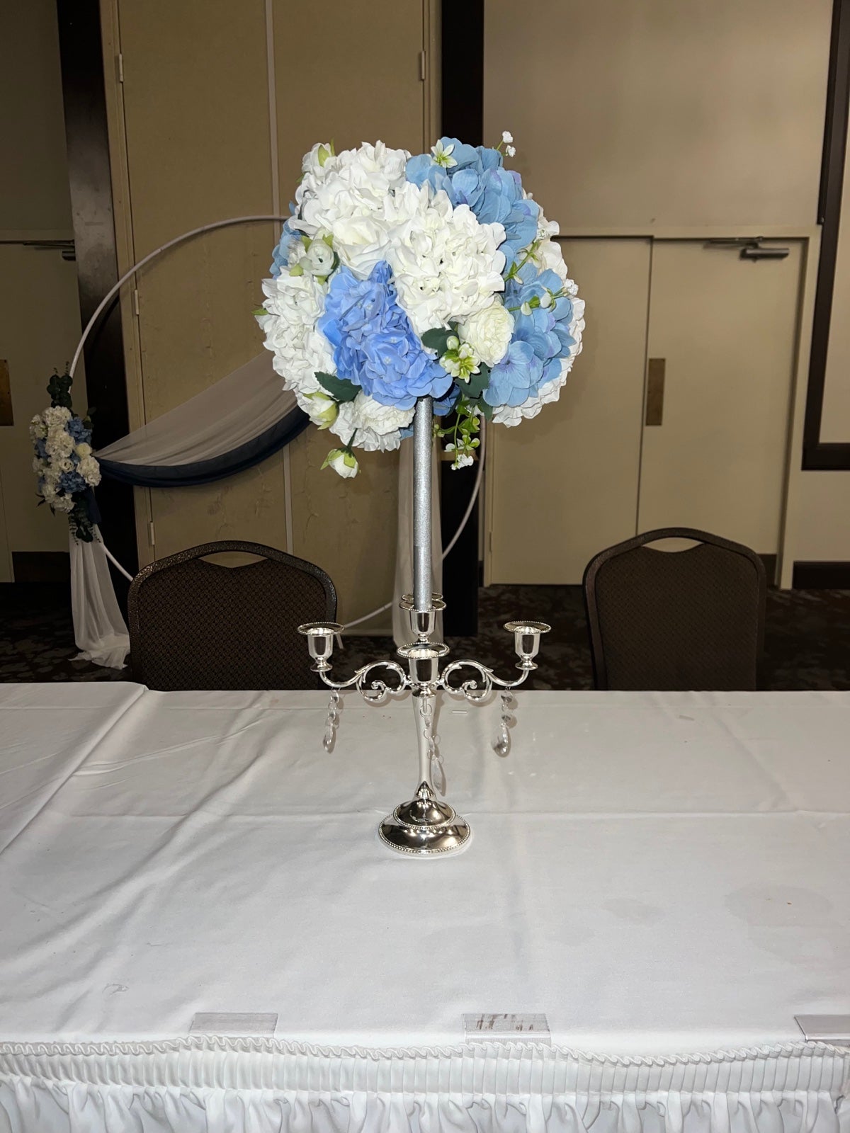 Hydrangea and roses candelabra wedding centerpieces