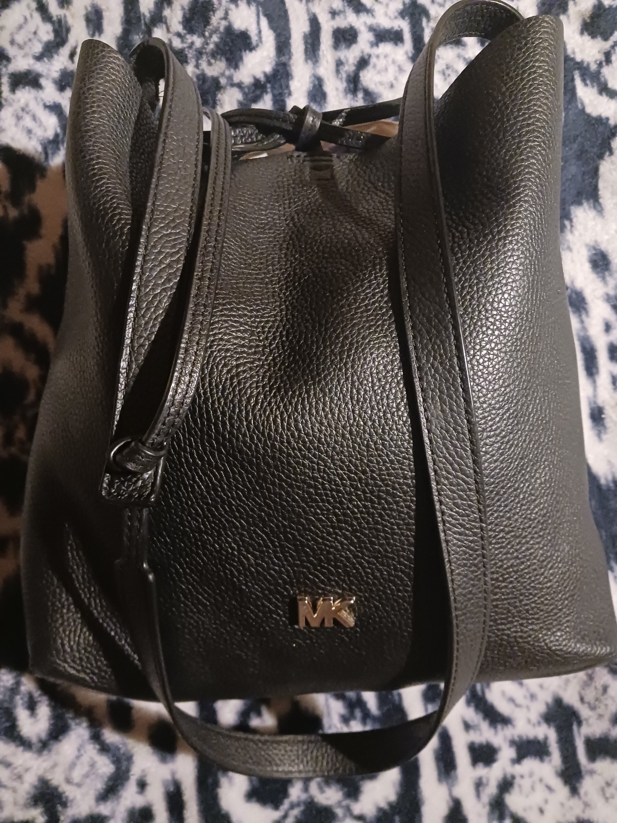 MICHAEL Kors black leather bucket style handbag.