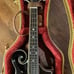 The Loar Vintage Sunburst mandolin and case