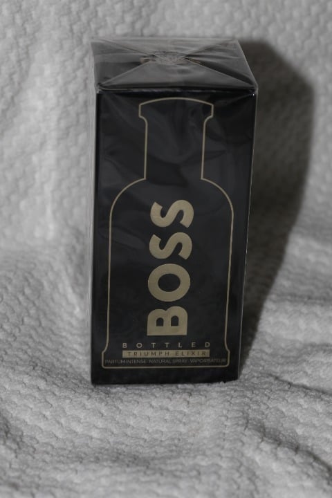 New 3.3 Ounce Boss Bottled Triumph Elixir Parfum Intense