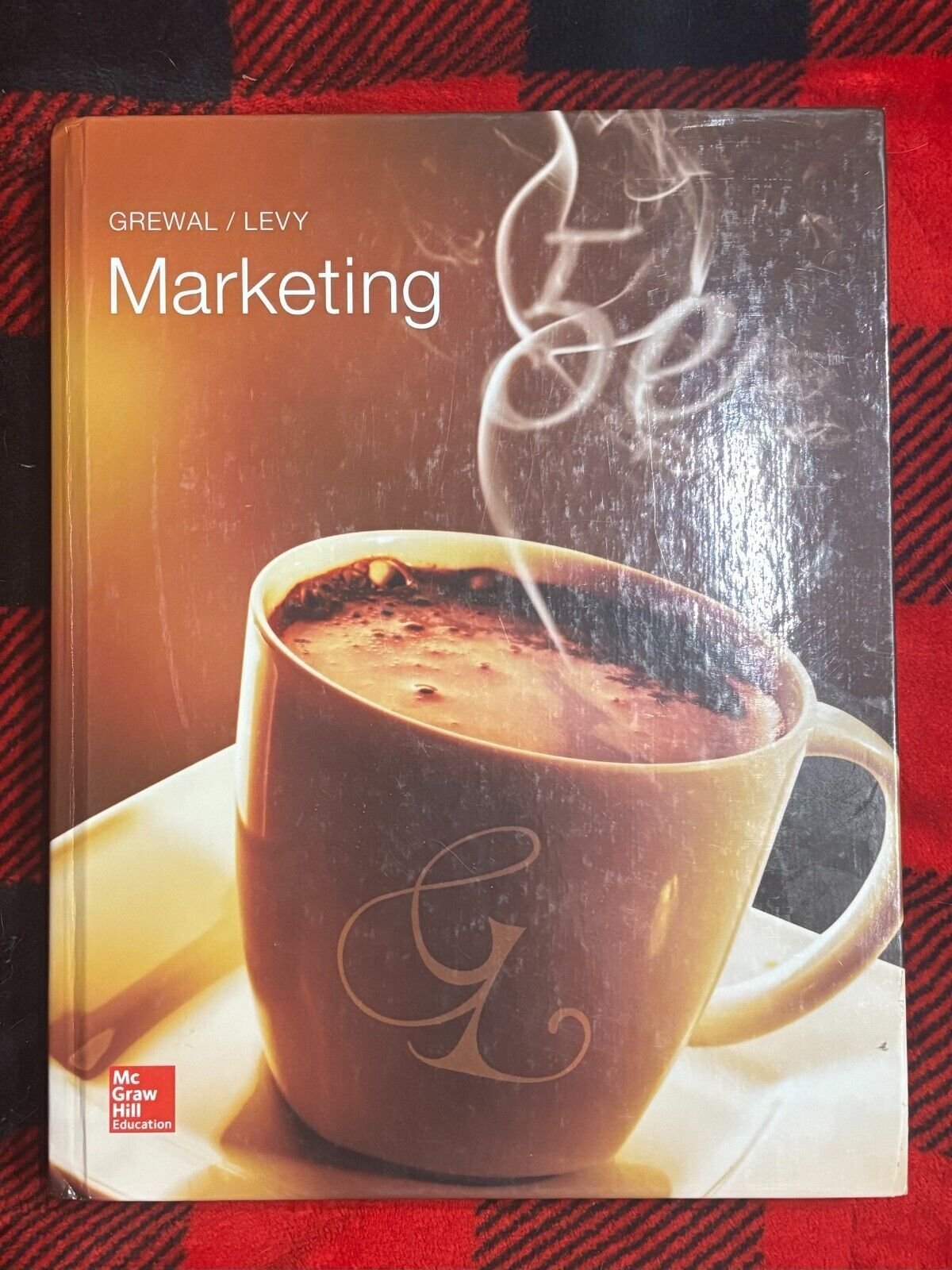 Marketing (5th Ed) Hardcover Book by Grewal and Levy - Mc Graw Hill Education