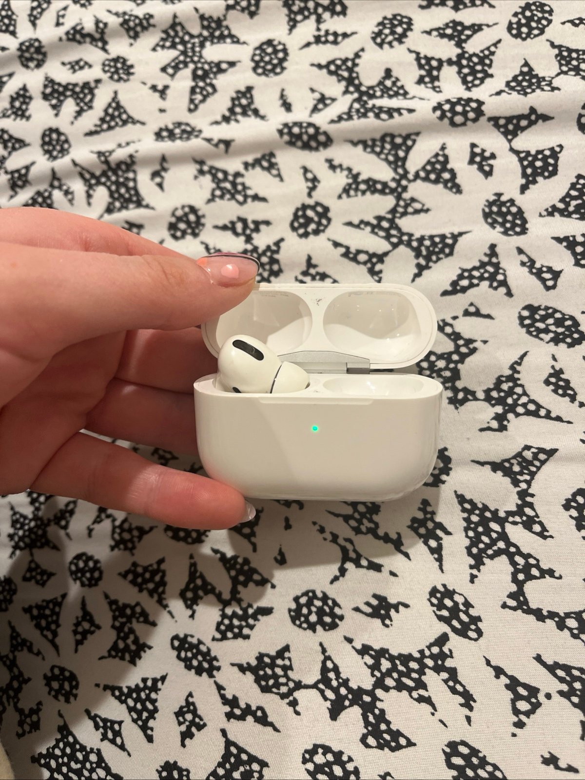 AirPod pro case and left AirPod