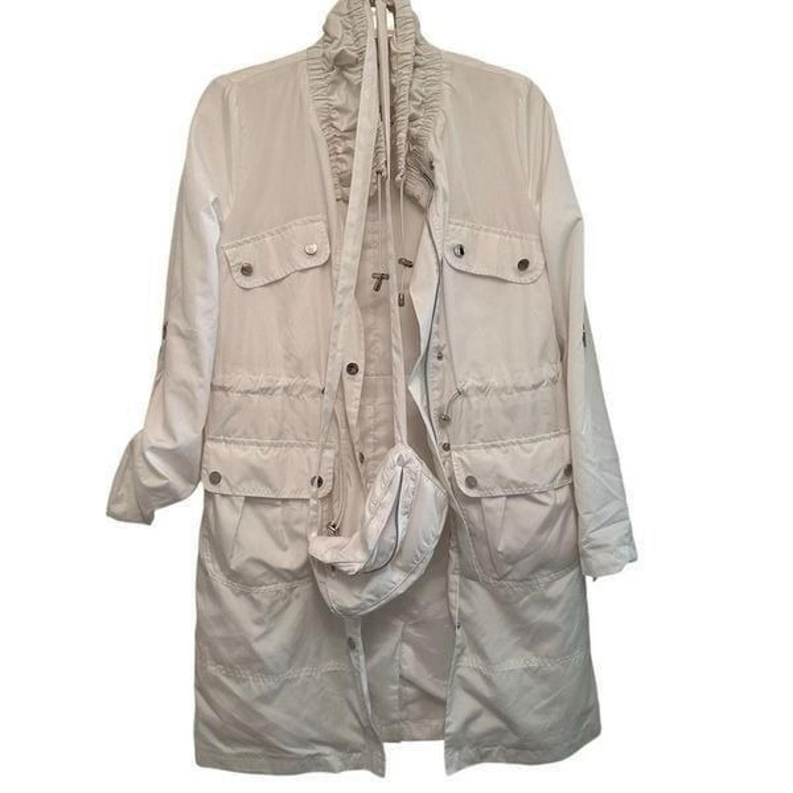 Black Rivet white rain coat