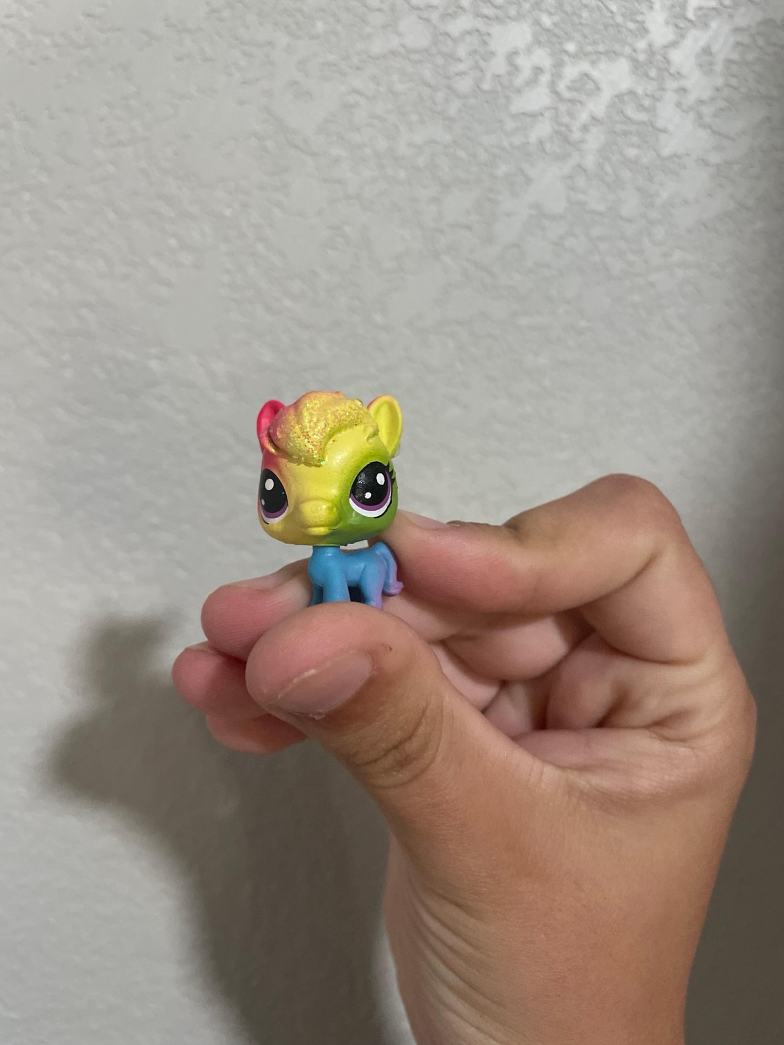 Littlest Pet Shop (LPS) toy, specifically the #26 Prisman Highhoof Mini Glitter