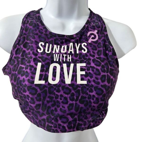 With peloton Sunday with love sports bra, purple and black size M. A 525.