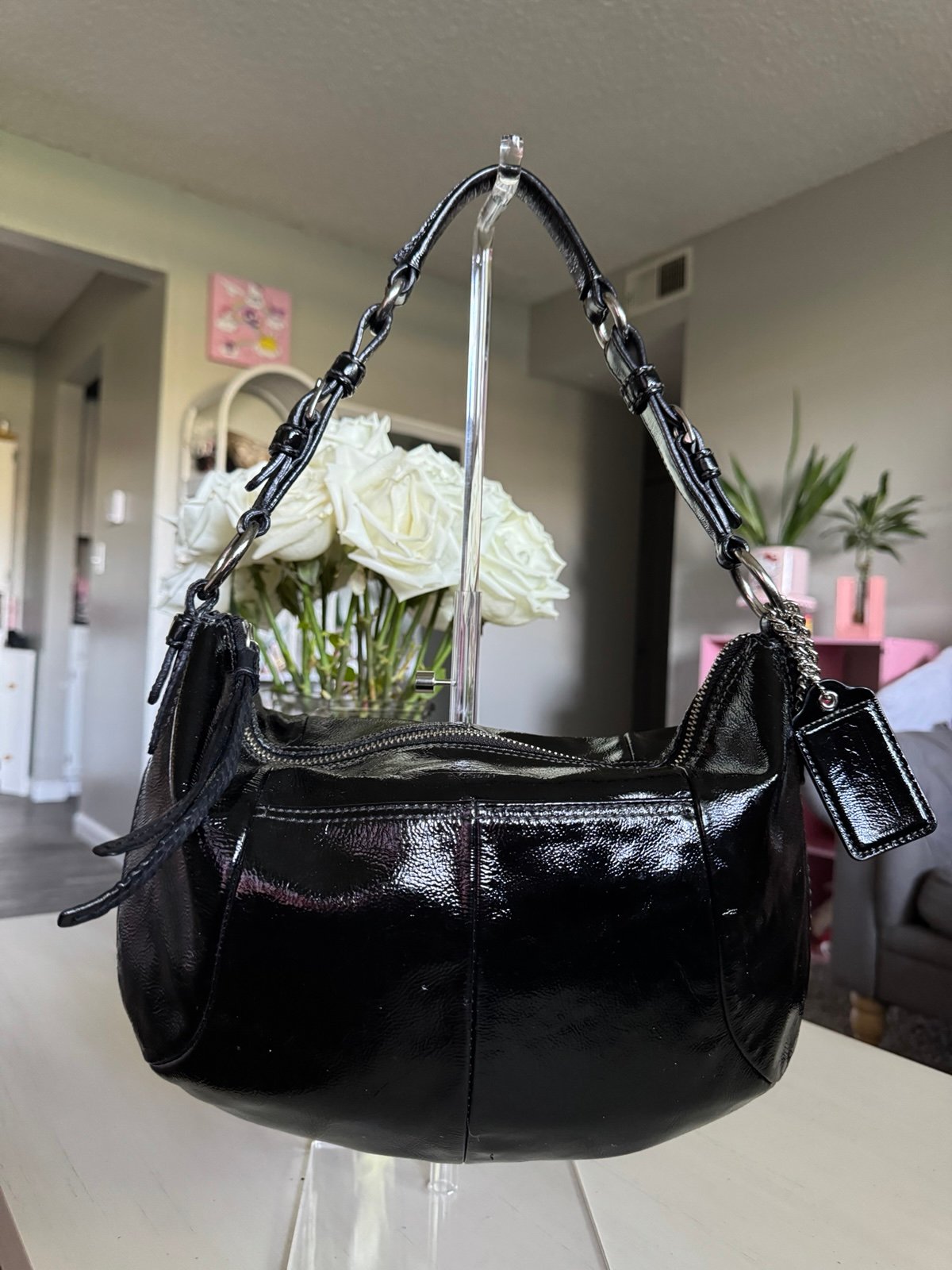 Sleek black coach hobo bag