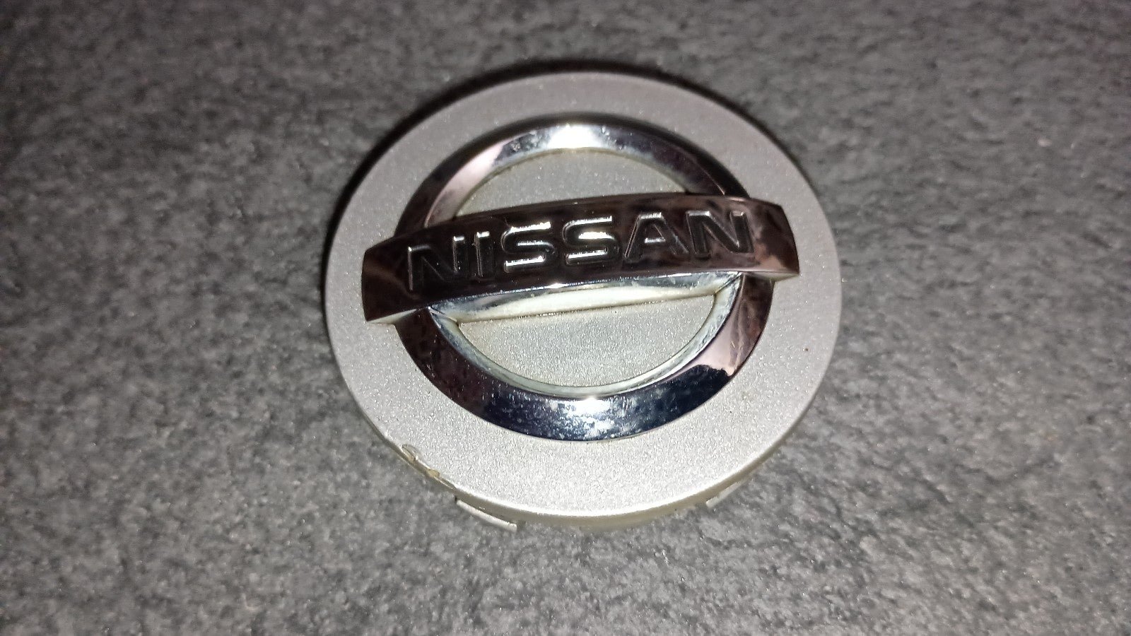 2-Nissan OEM wheel center caps