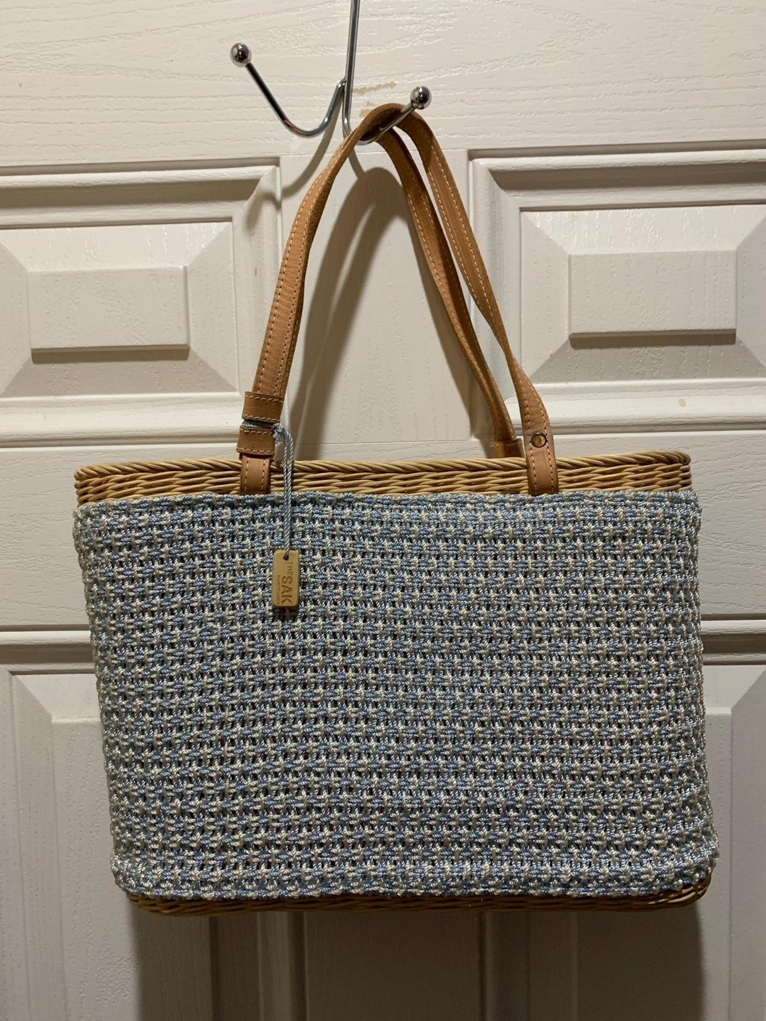 The Sak wicker/woven light blue tote bag