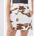 UO Rosie Cow Print Pelmet Animal Chic Hipster Hippie Boho Bohemian Mini Skirt