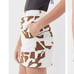 UO Rosie Cow Print Pelmet Animal Chic Hipster Hippie Boho Bohemian Mini Skirt