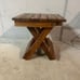 Handmade wooden footrest or potstand.