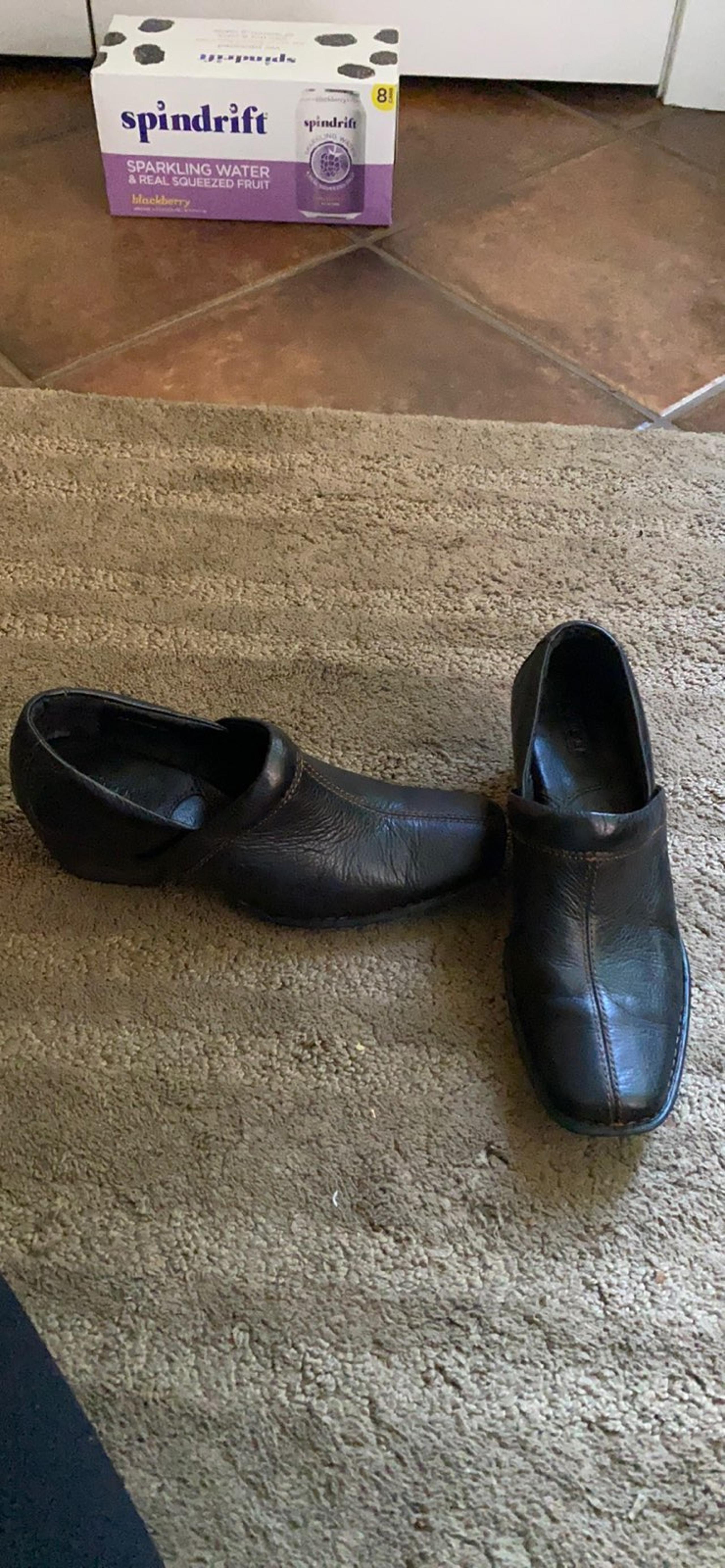 Black leather Born slip on shoes