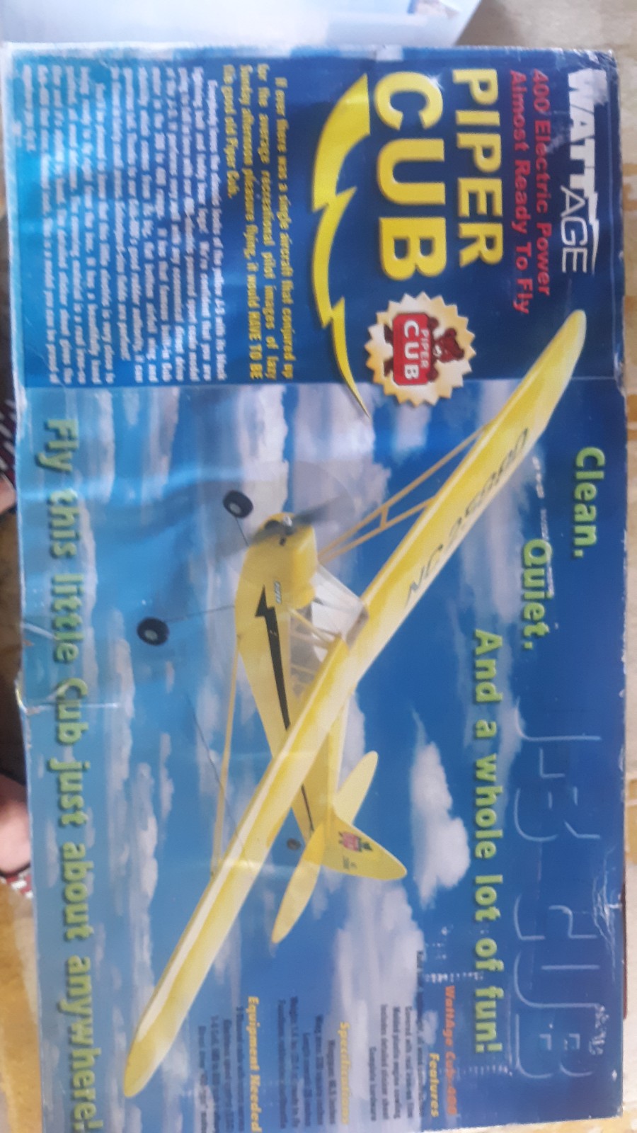 Wattage age piper club yllow j-3 plane