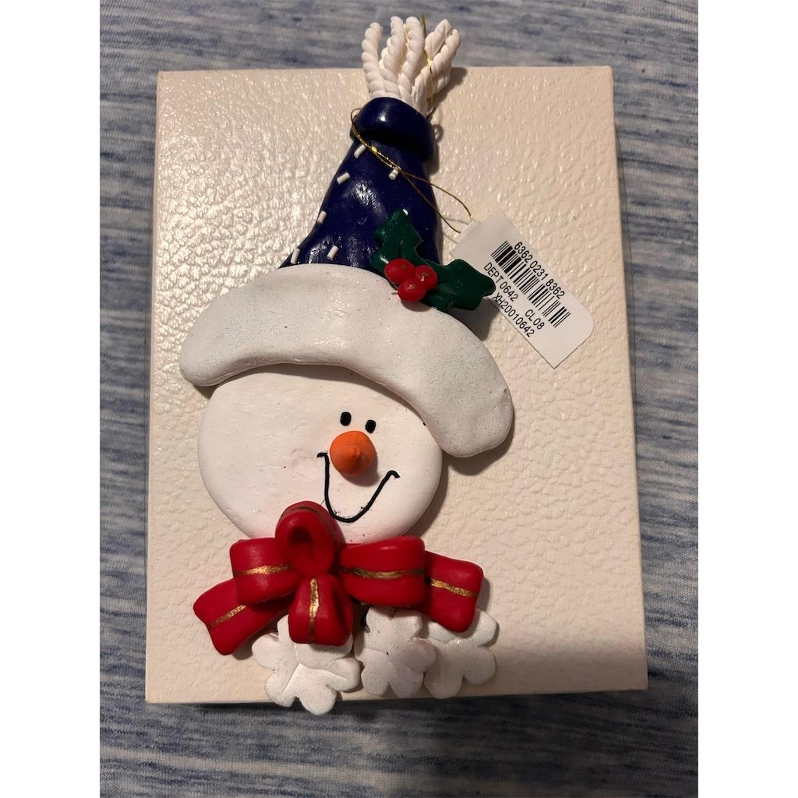 Festive Snowman Ornament with Red Bow and Blue Hat Christmas Decor