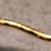 18kt ribbed huggies earrings