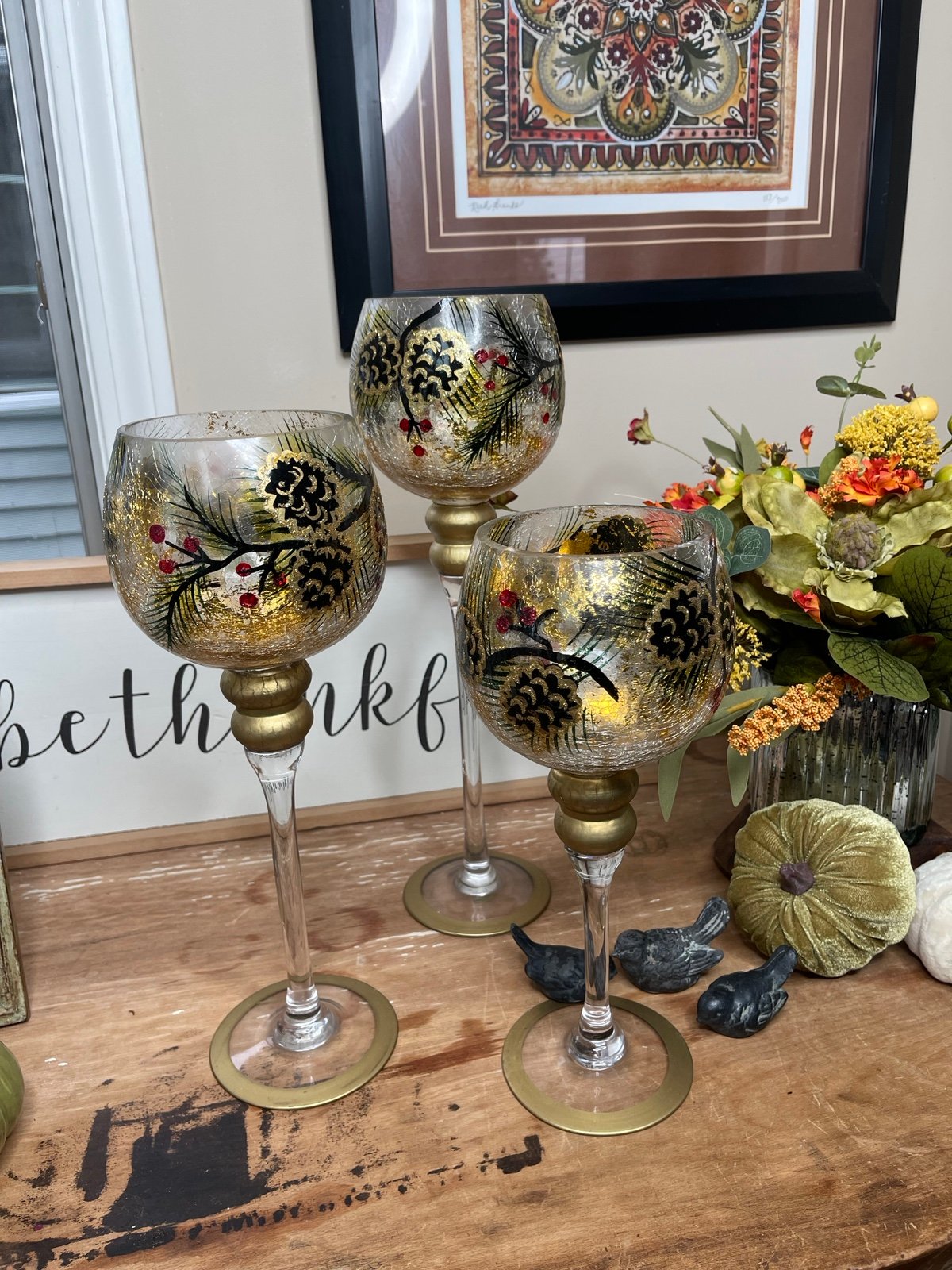 Set of 3 hand painted stemmed glass tea light holders