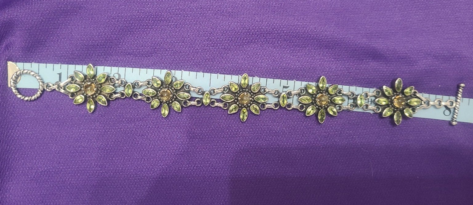 Vintage 925 Doug Paulus bracelet, peridot and looks like citrine 8 inches long