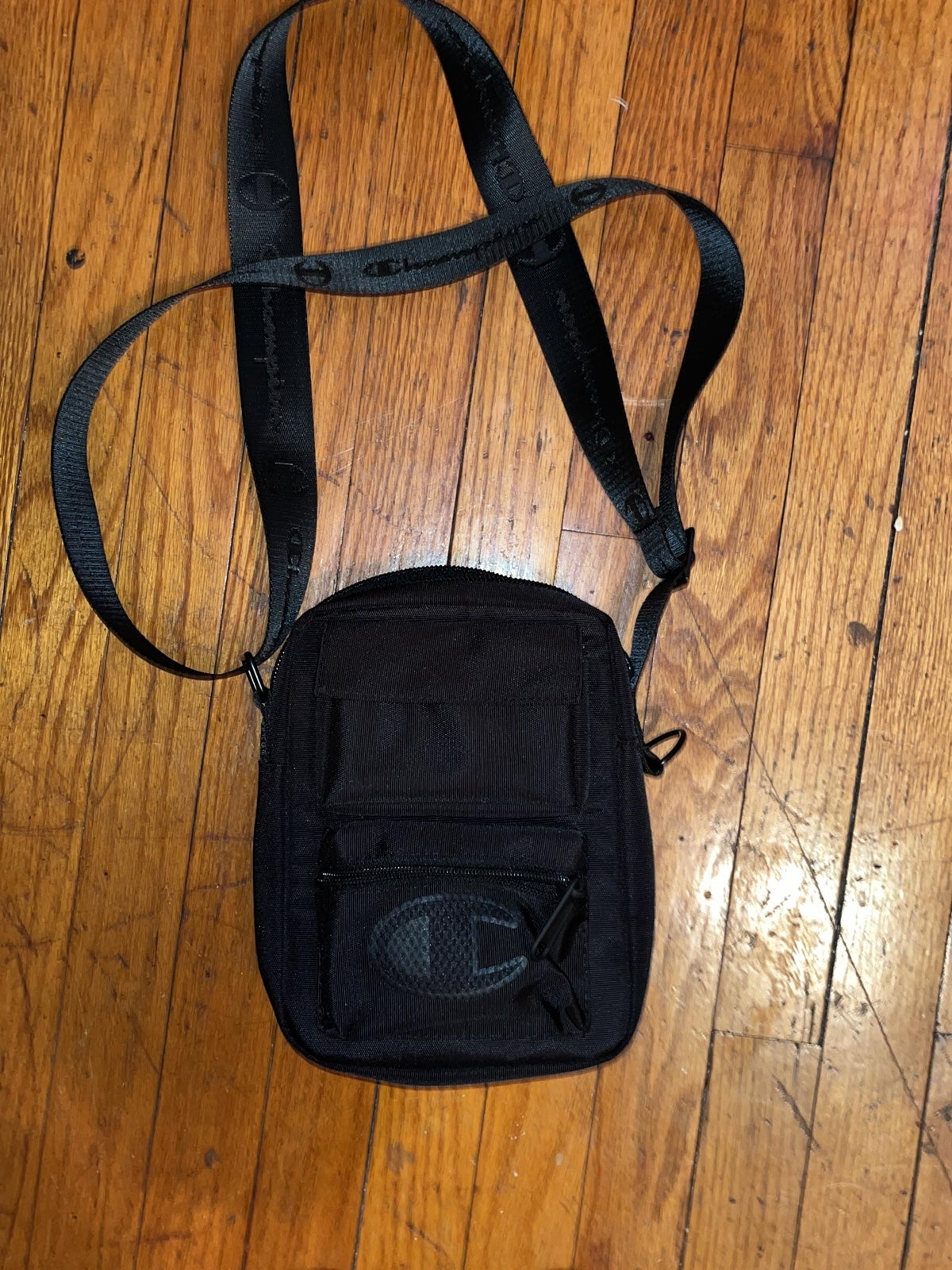 Champion black crossbody bags