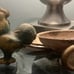 Vintage tin Wyandotte rooster pulling egg cart toy