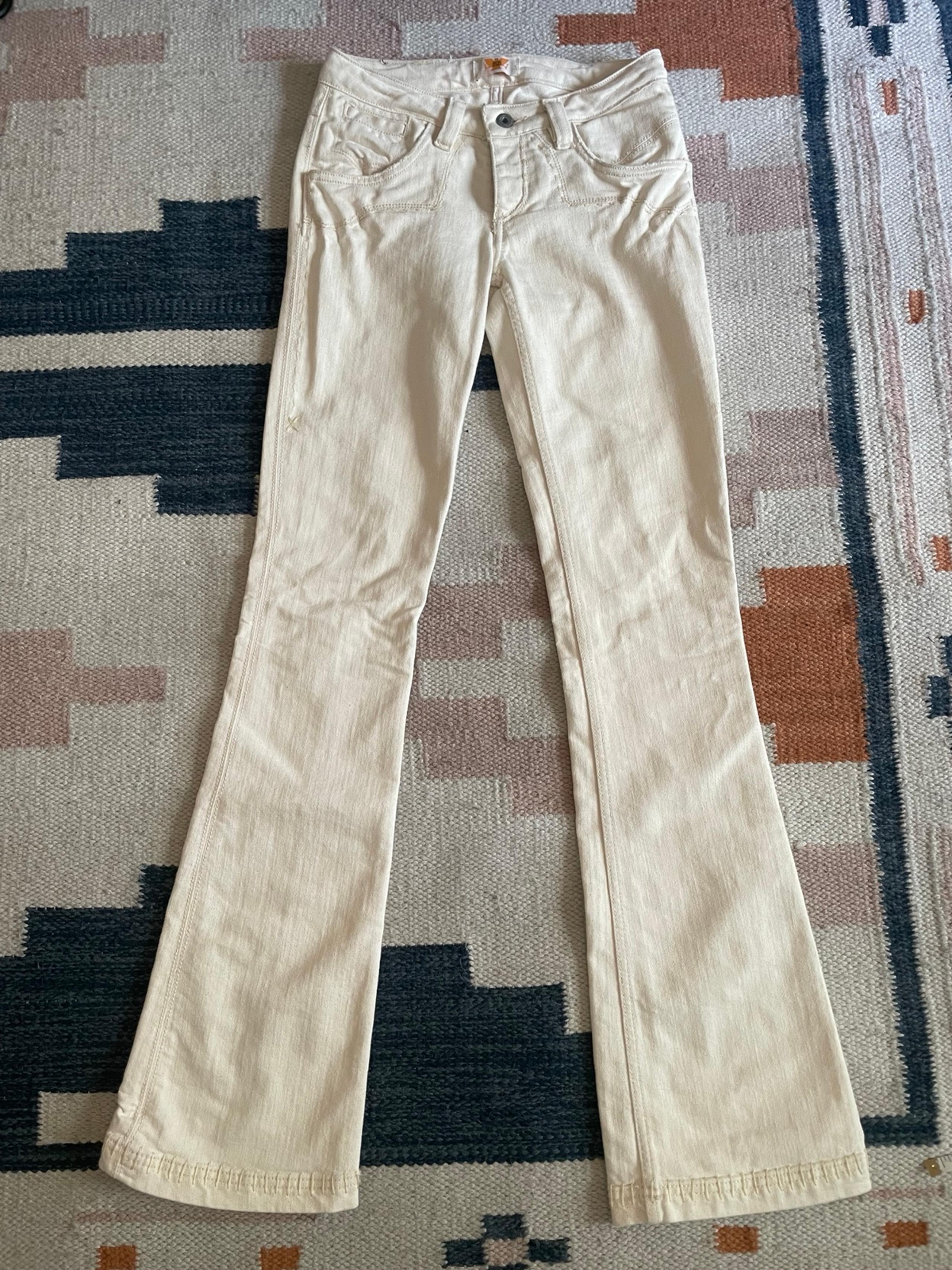 Like new ivory Antik Denim flare/bellbottom jeans