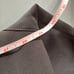 Gallery Woman 3X black trench coach with scarf