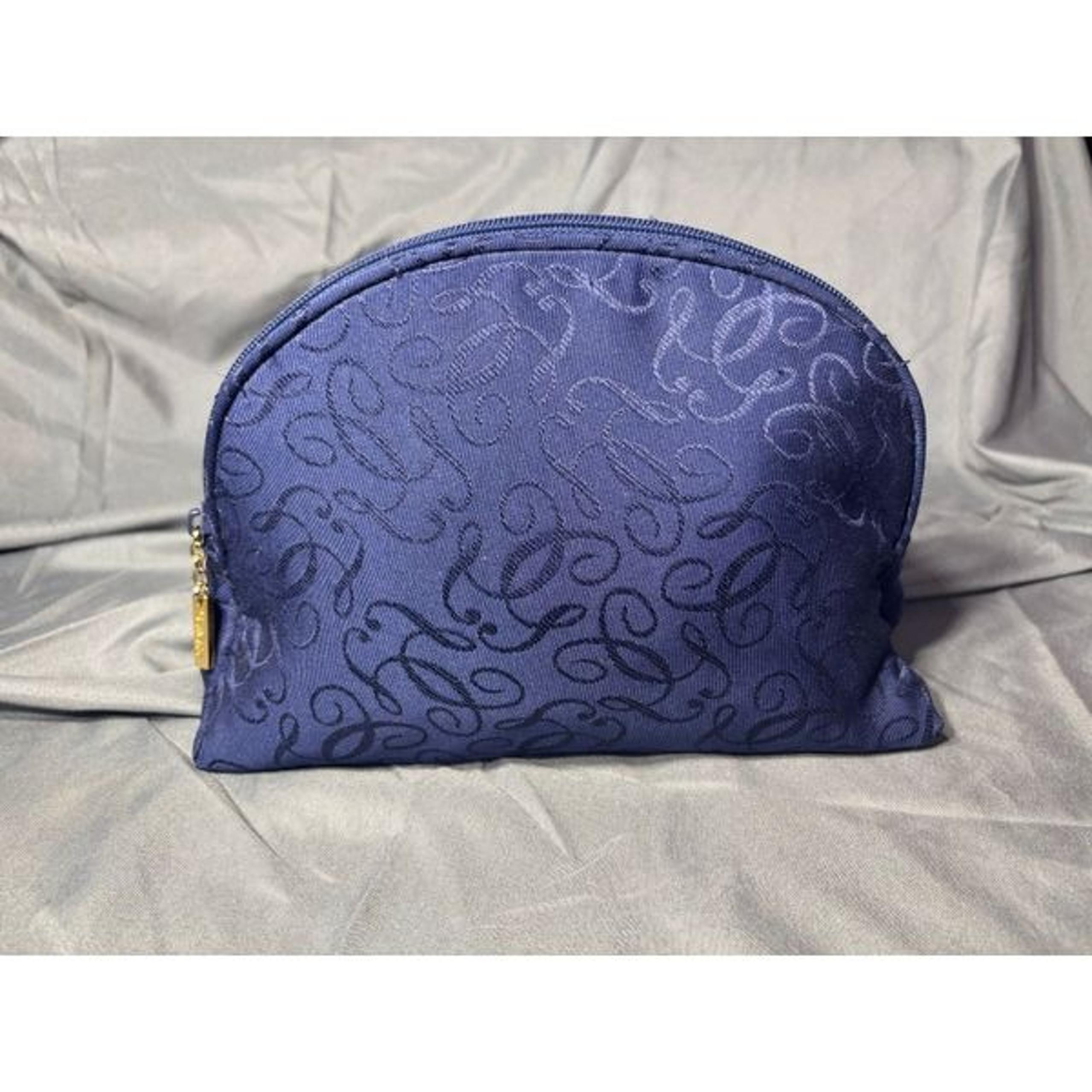 Vintage Guerlain Paris Navy Blue Canvas Cosmetic Travel Makeup Pouch/Bag EPC

Gu