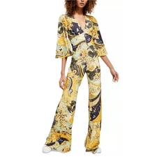 Free People Retro Night Fever Wide Leg Deep V-Neck Jumpsuit Size Medium