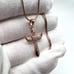 Rose Gold Plated over Sterling Silver Winged Cz Cross Necklace