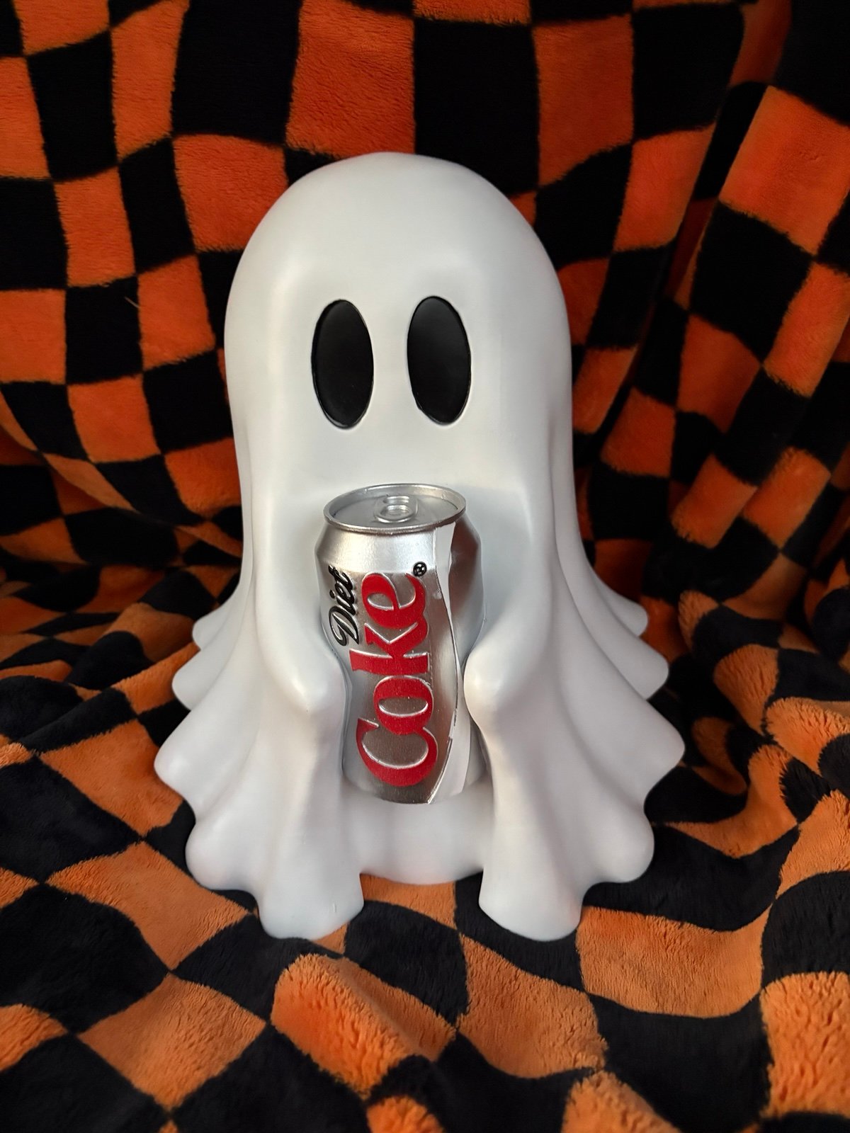 Viral ghost holding Diet Coke