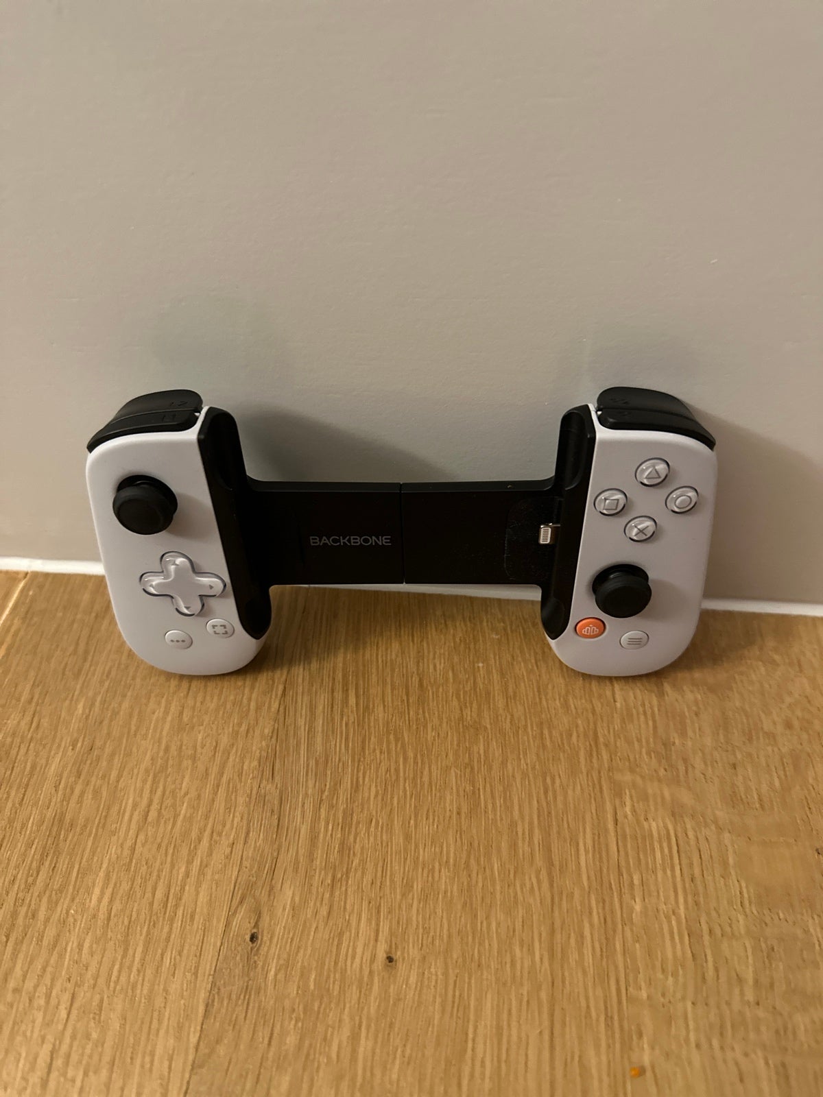 iPhone, aniPhone, and android Backbone, PlayStation edition, never has been used