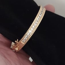 G r a certified 20 carat positive testing 18K / 925 Sterling bangle bracelet