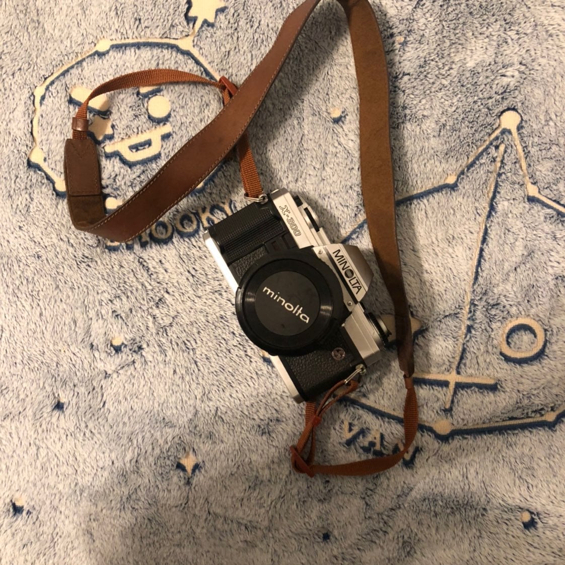 Minolta x 300 body, lens, & strap