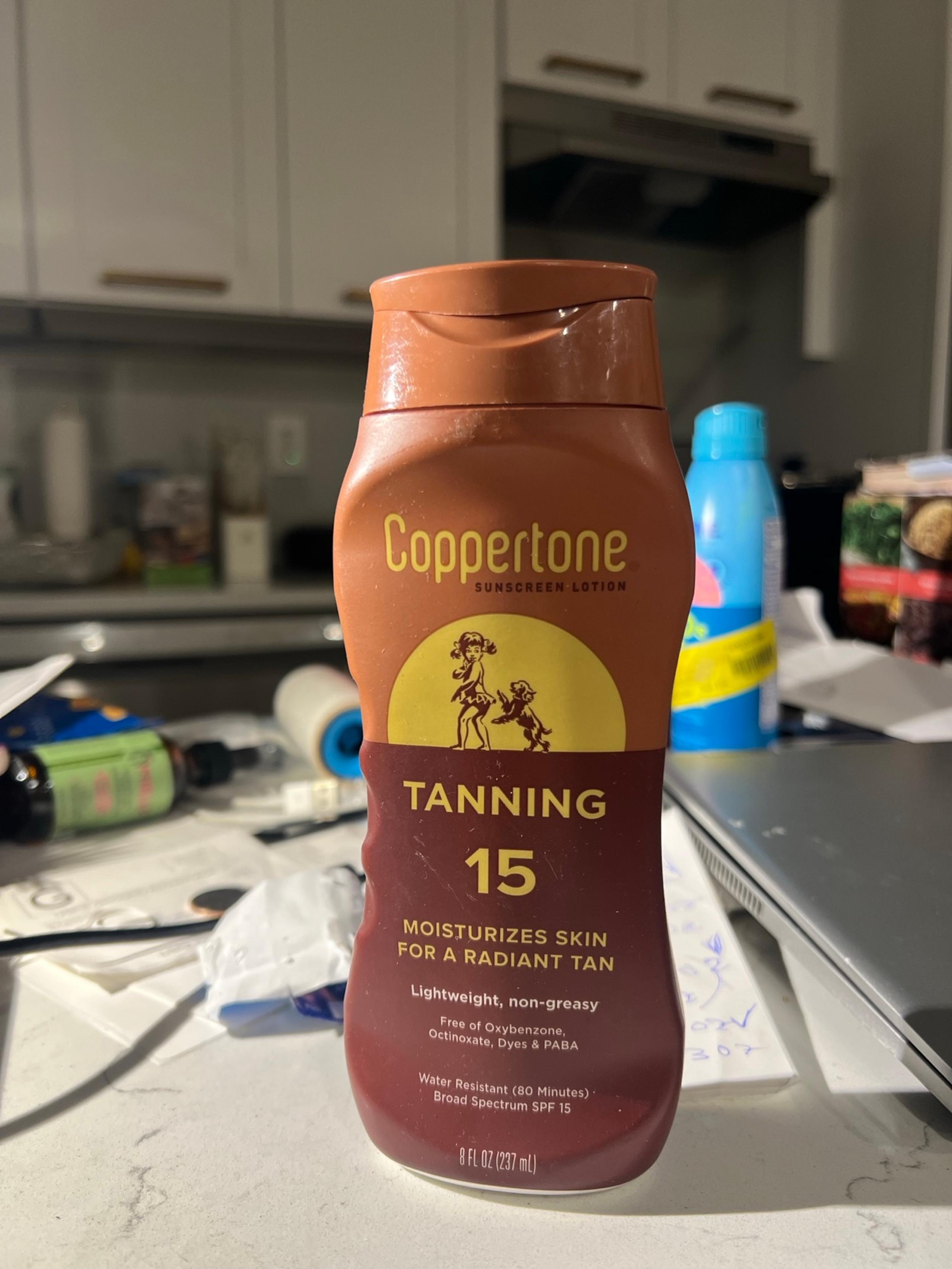 Coppertone Sunscreen Lotion Tanning SPF15 moisturizes skin for a radiant tan
