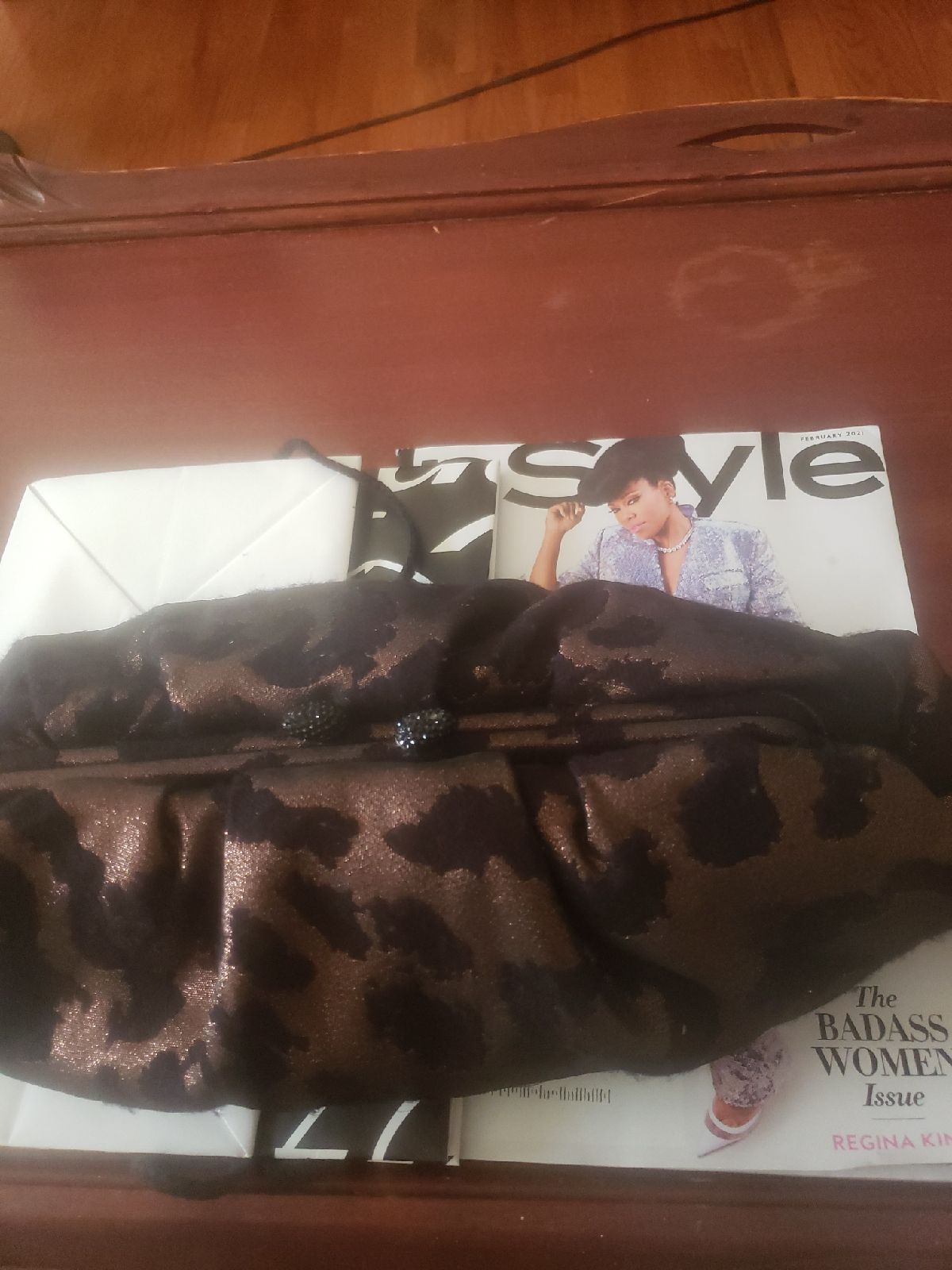 Brown black fabric print clutch with jew
