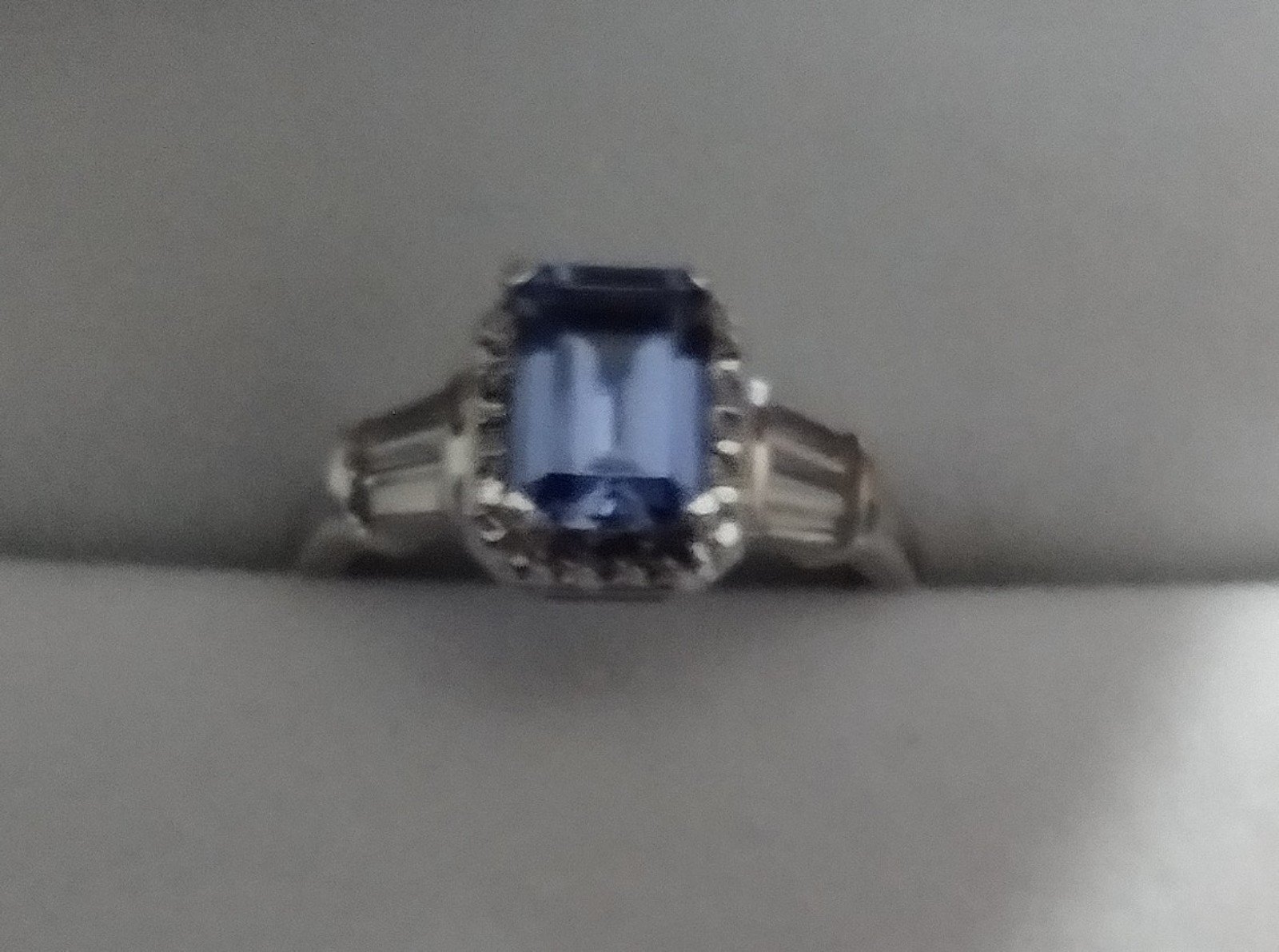 Lab created Ceylon sapphire and white sapphire ring in 10K White gold. Size 7