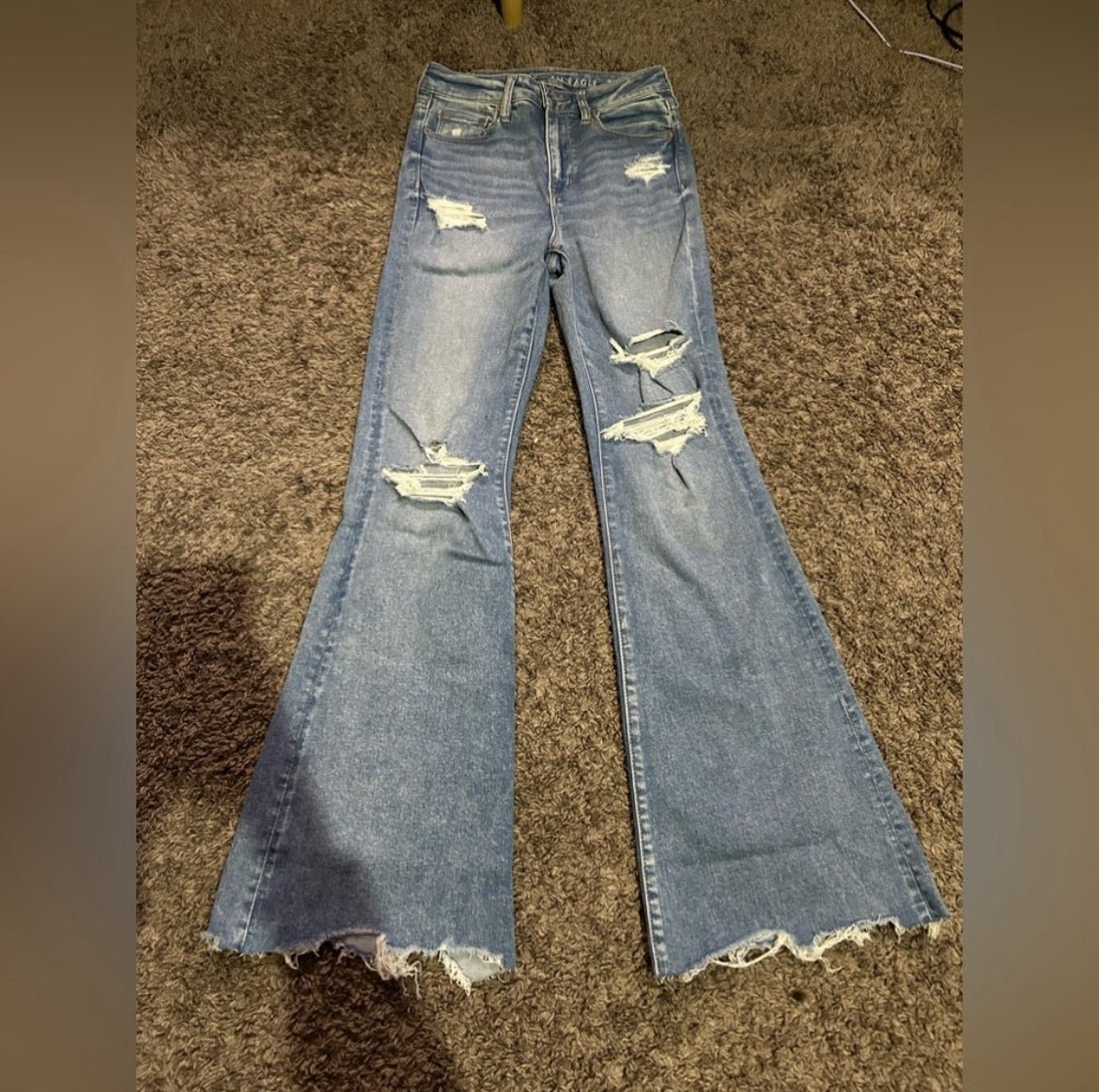 Fringe bottom best sale jeans american eagle